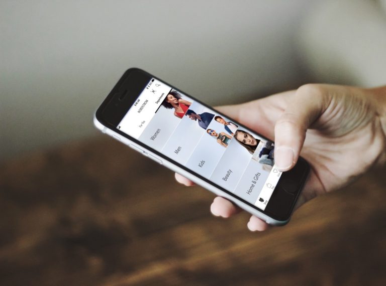 Hand holding smart phone