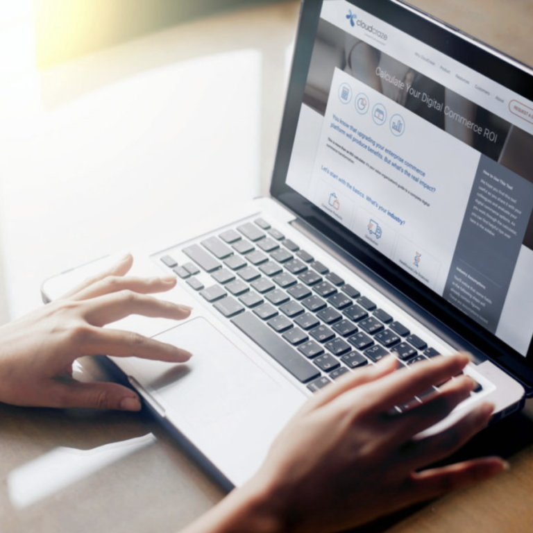 person using trackpad on laptop