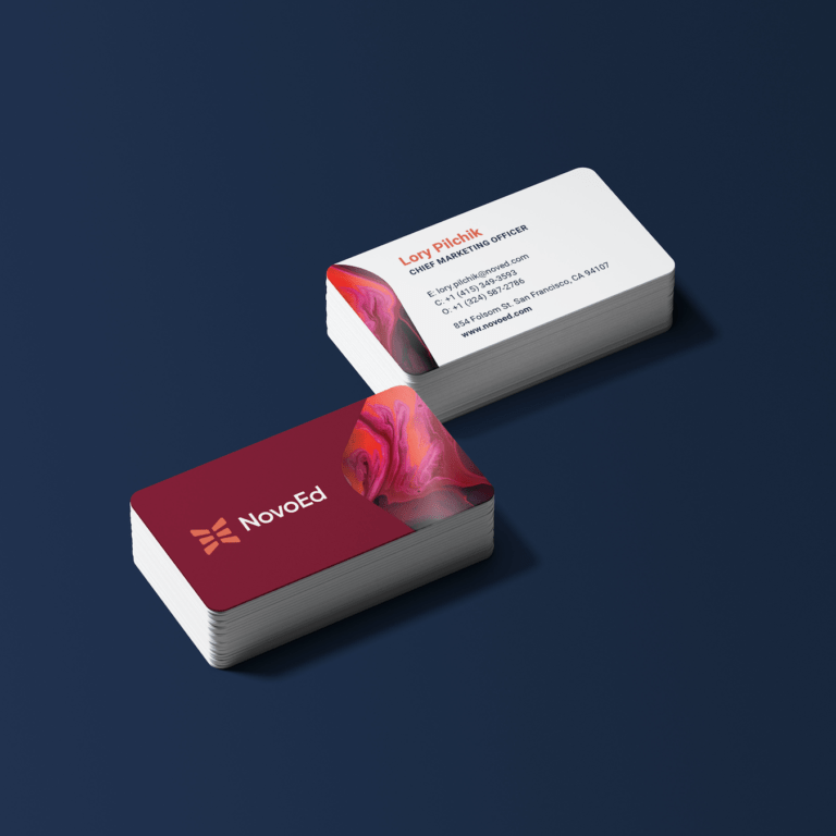 Mockup of NovoEd business cards featuring their new branding