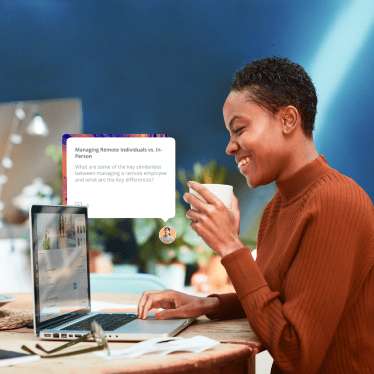 Mockup of woman sitting at a laptop and interacting with NovoEd's new website
