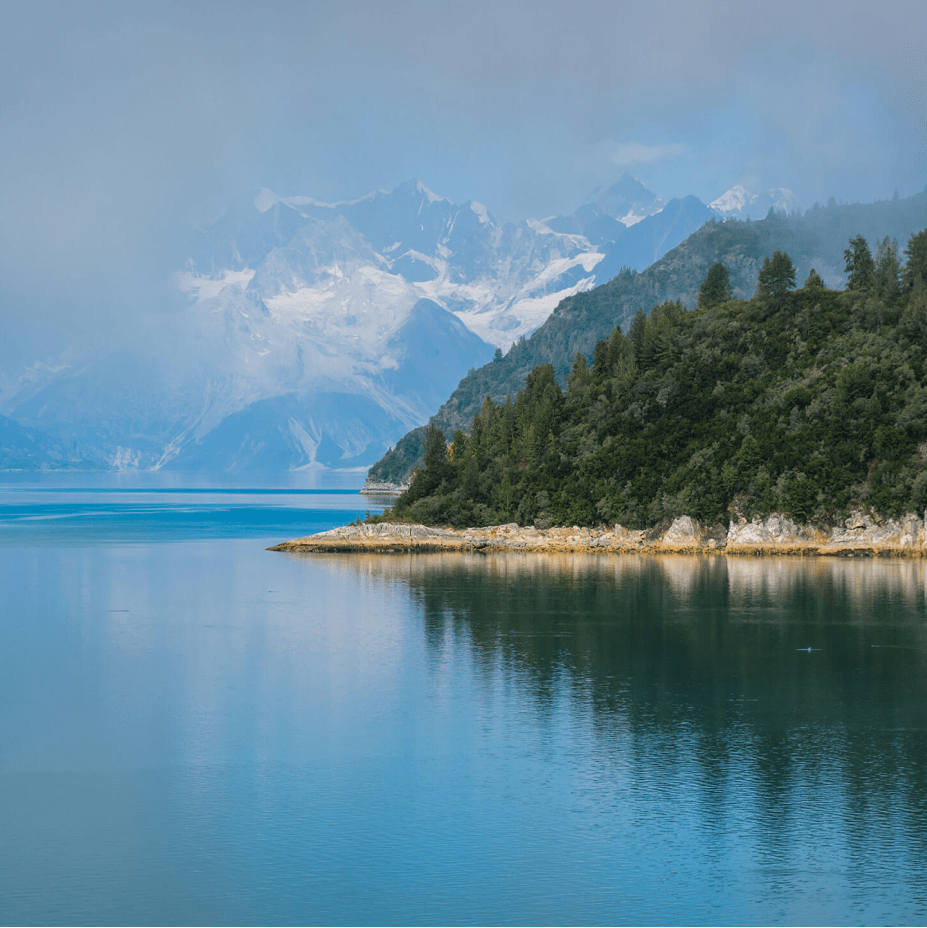 Photograph of a lake next to mountain range that showcases example of Haley & Aldrich website imagery