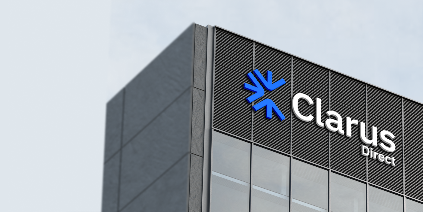 an office building with the new clarus direct logo: three light blue arrows pointing in, to create a snowflake shape.