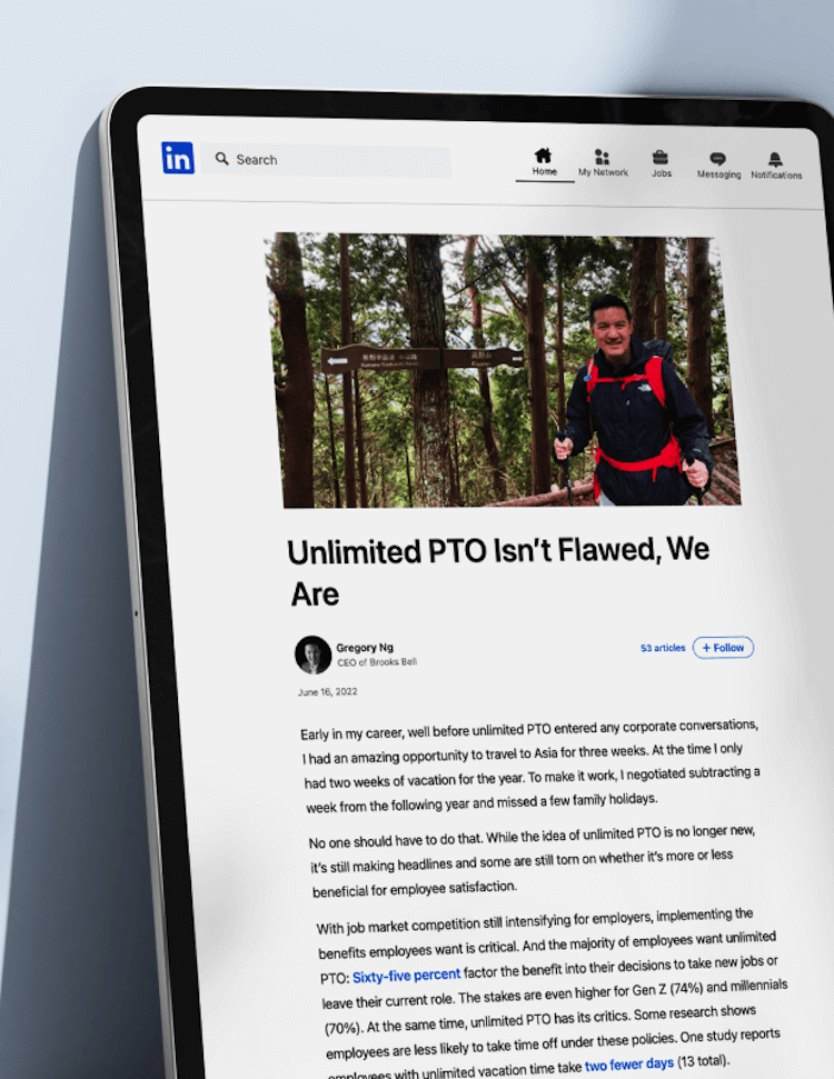 Mockup of LinkedIn article entitled "Unlimited PTO Isn't Flawed, We Are" on iPad