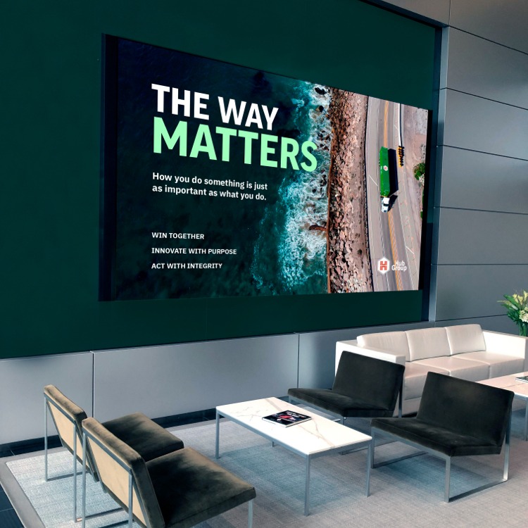 rendering of a lobby screen featuring hub group's rebranded website