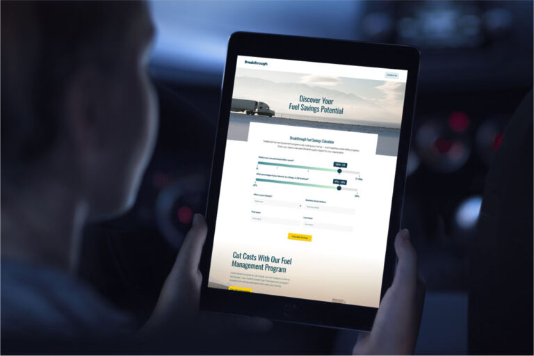 a person holding a tablet displaying a breakthrough landing page titled "discover your fuel savings potential"
