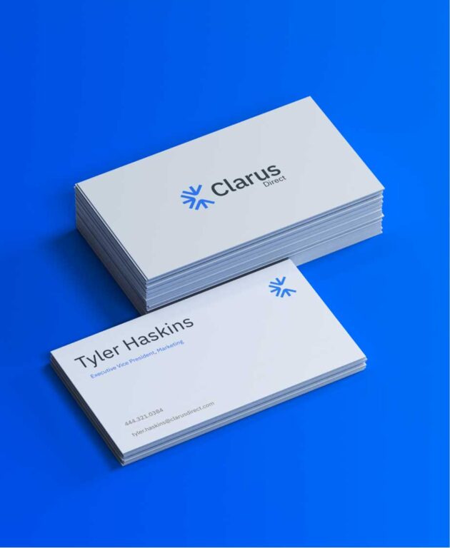 a stack of clarus direct branded business cards