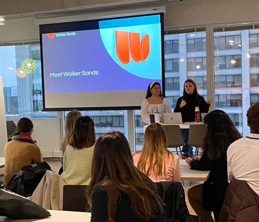 Walker Sands employees speaking at a PRSSA Chicago event held at the office.