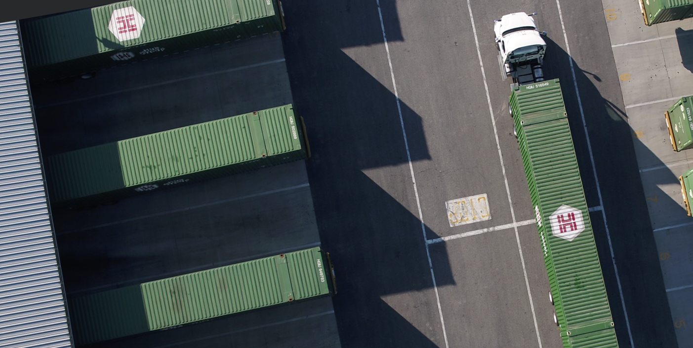 aerial photo of a semi-truck with the hub group logo 