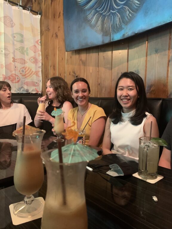 The Walker Sands Seattle team sitting at a restaurant table during their annual International District Food Crawl