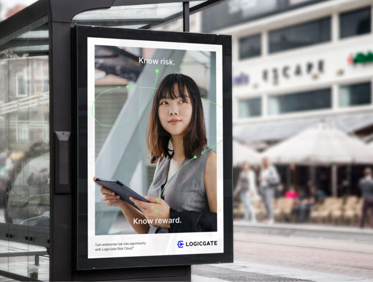 a mockup of a billboard on the side of a bus shelter that reads "know risk. know reward" with a photo of a woman in a suit vest looking up from a laptop, with a thin light green arrow winding around her