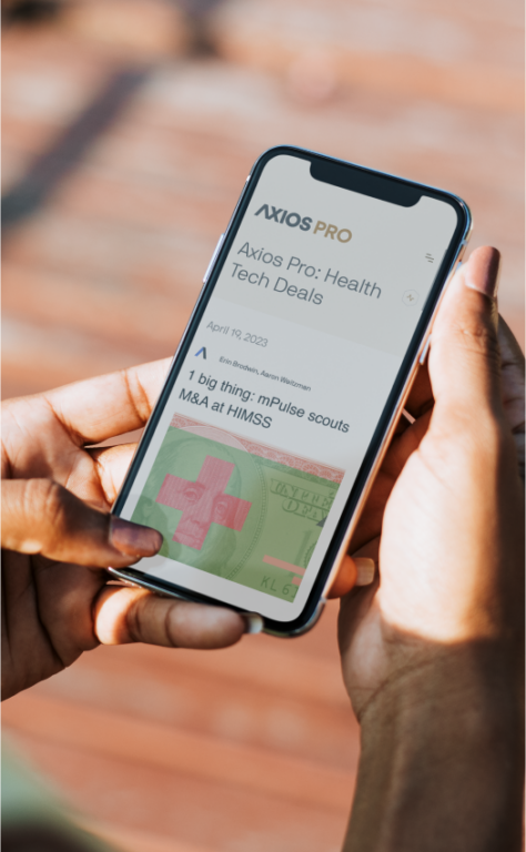 Woman's hands holding phone and scrolling through news article