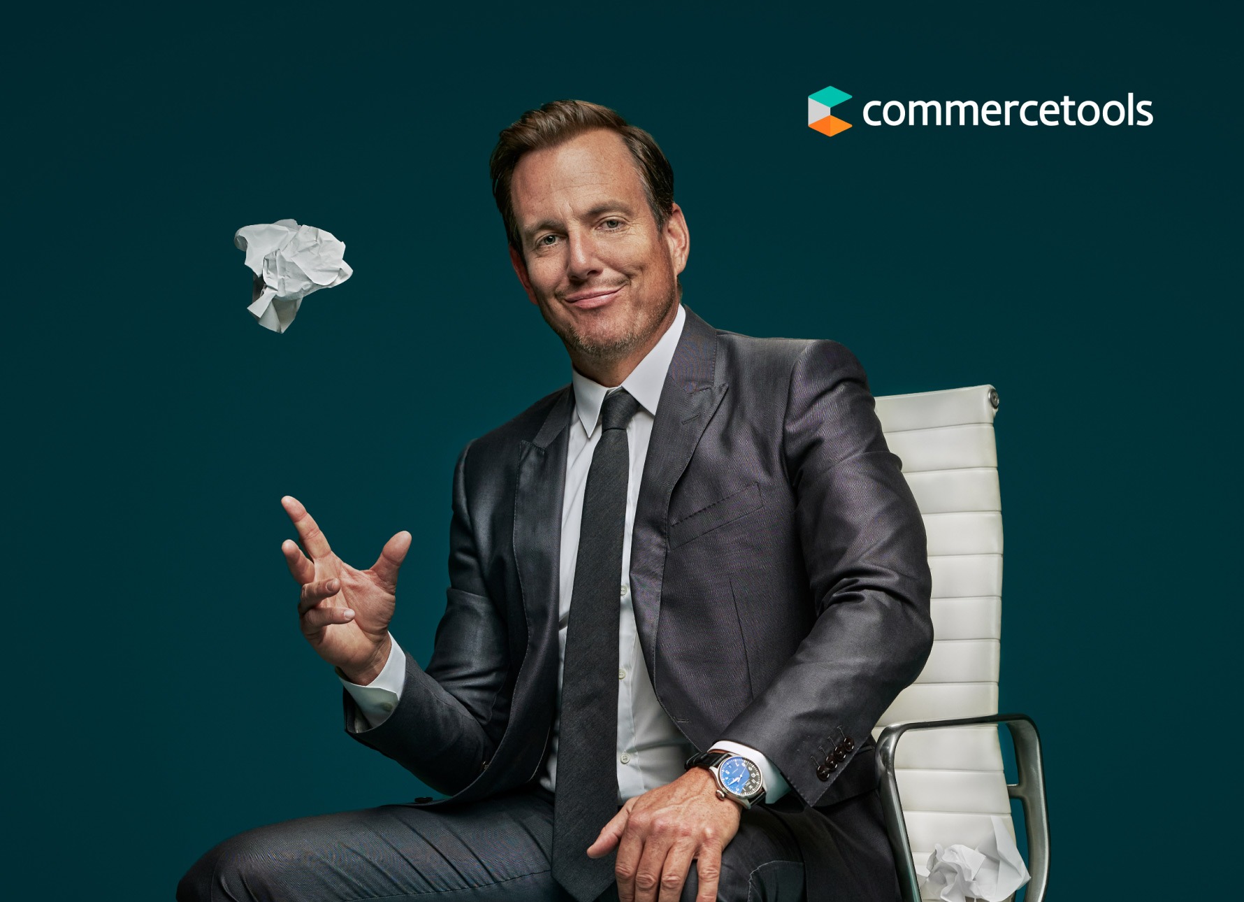 photo of will arnett as the naysayer throwing a piece of crumpled paper with the commercetools logo in the top right corner