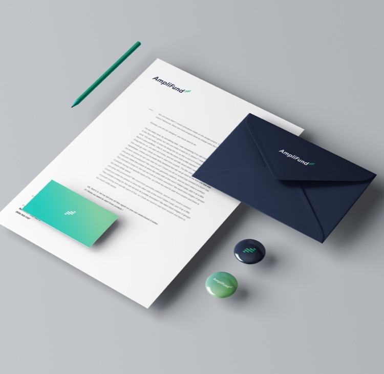 a pen, letter, business card, envelope and buttons with green and blue amplifund branding