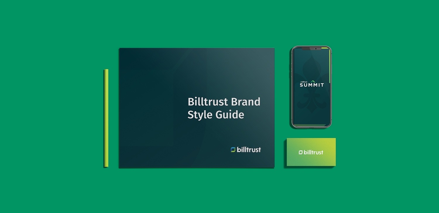 a green book titled "billtrust brand style guide" next to a light green billtrust business card and a smartphone with the billtrust summit app open