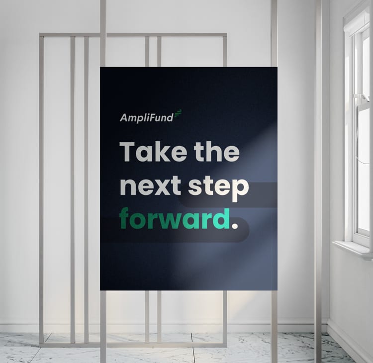 sign that reads "amplifund Take the next step forward" hanging in a white room