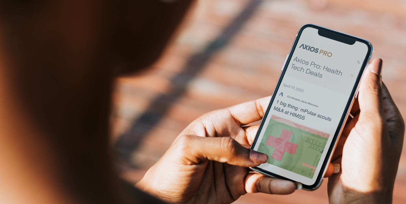 a person holds a phone displaying an axios article about mPulse 